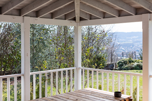 Wooden Veranda view with Green Garden Background