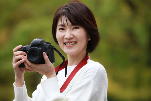 istock Woman taking a picture 1382891318