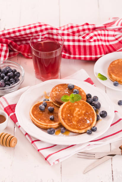 istock Pancakes with blueberries and chocolate cream. 1382893487
