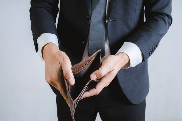 istock Businessman pickpocket with no money 1382898963