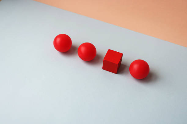 istock Conceptual image of geometric shapes. Standing out from the crowd. 1382901023