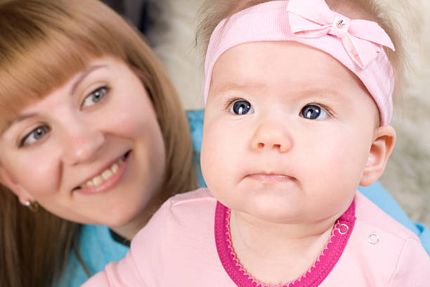 Portrait of happy mother with her daughter