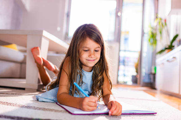 istock Beautiful girl drawing 1382904772