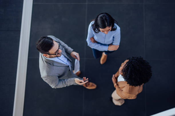 istock Top view of people, talking to each other. 1382905679