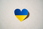 Ukraine flag color heart made of paper