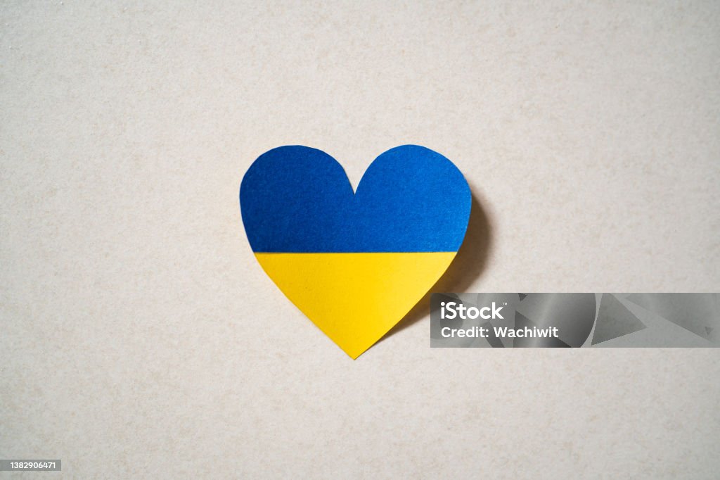 Ukraine flag color heart made of paper Support Stock Photo