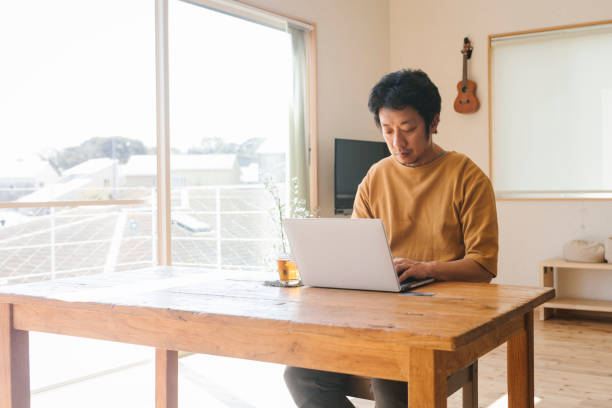 istock Man enjoy online shopping at home 1382907454