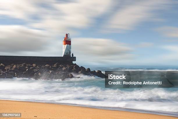 Lighthouse Long Exposure In Hossegor France Stock Photo - Download Image Now - Beach, Breaking Wave, Building Exterior