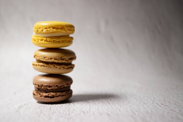 istock macaroons stacked color with copy space on a neutral background 1382909568