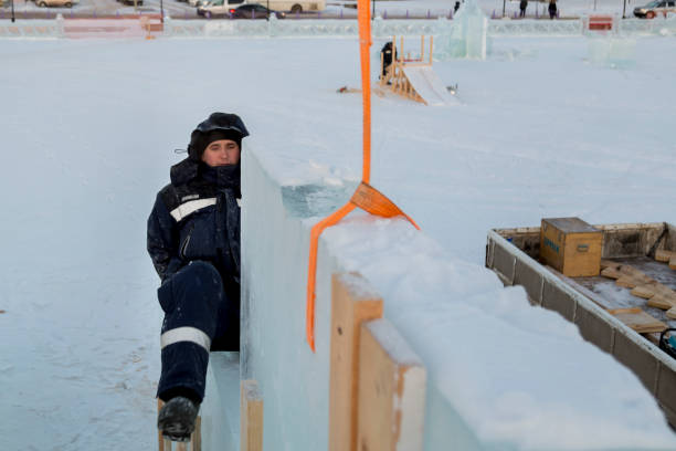 istock Worker on the installation of an ice panel 1382911773
