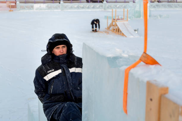 istock Worker on the installation of an ice panel 1382912365