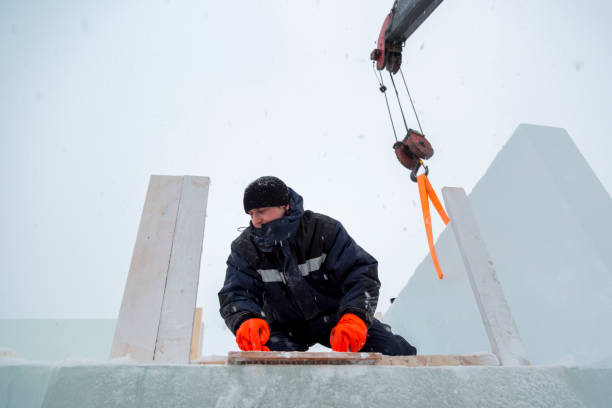istock Assembler at the construction site with a brush in his hands 1382912599
