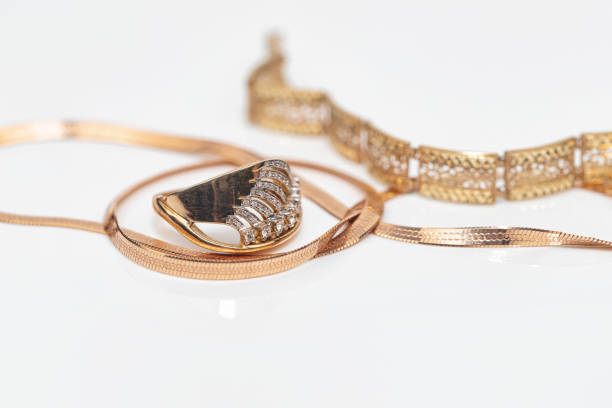 istock Engagement ring of gold and different weave chain 1382912782