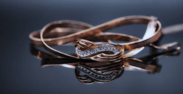 istock Elegant gold ring decorated with small precious stones 1382913544