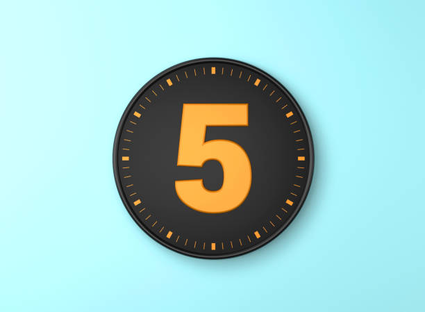 Number 5 Over Black wall clock on blue background. Number 5 Over Black wall clock on blue background. Time concept. five minutes timer stock pictures, royalty-free photos & images