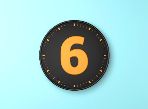 Number 6 Over Black wall clock on blue background. Time concept.