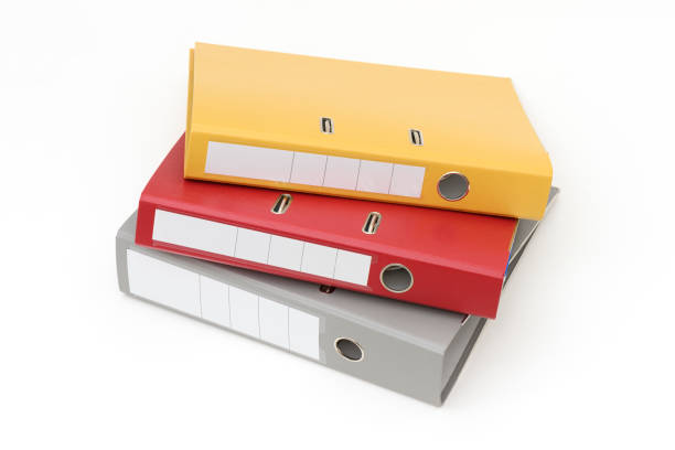istock Yellow, gray and red office folder on white background. 1382916080