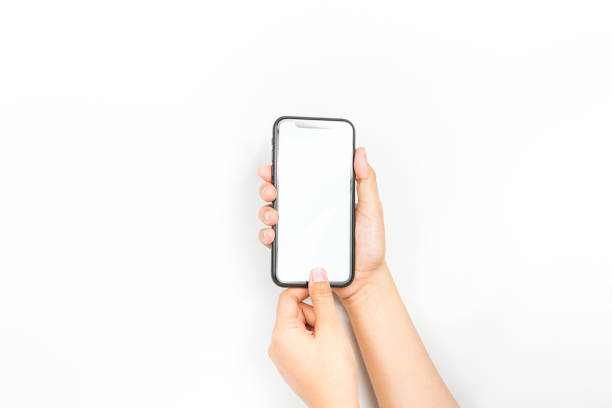 istock hand holding cell phone. smartphone with a blank white screen for mockup 1382916119