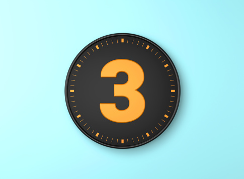 Number 3 Over Black wall clock on blue background. Time concept.