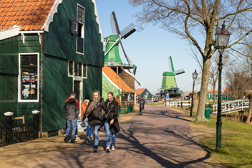 Zaanse Schans, The Netherlands, March 4, 2022; Walking and cycling in early spring through the Zaanse Schans.