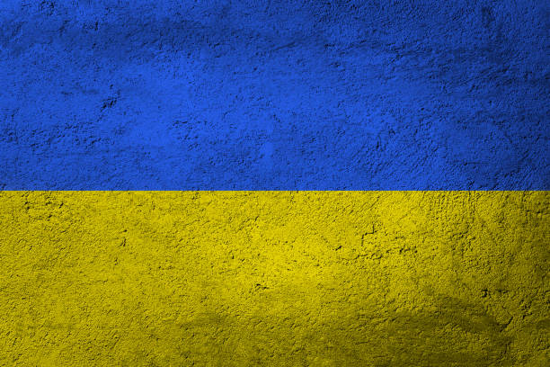 bandera de ucrania. bandera de ucrania de fondo. un primer plano de la bandera ucraniana. - ukraine war fotografías e imágenes de stock