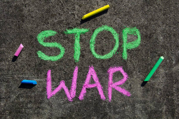 istock STOP WAR inscription. Chalk drawing on sidewalk. 1382941199