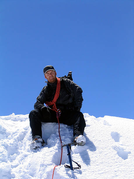 등반가 at summit 스톡 사진