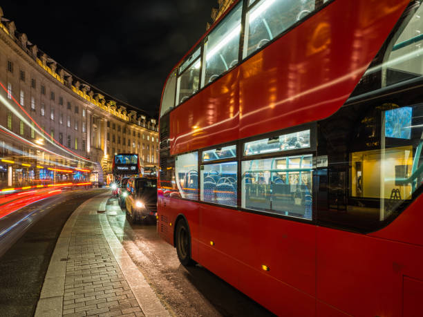 istock London red double decker buses on Regent Street at night 1382953245