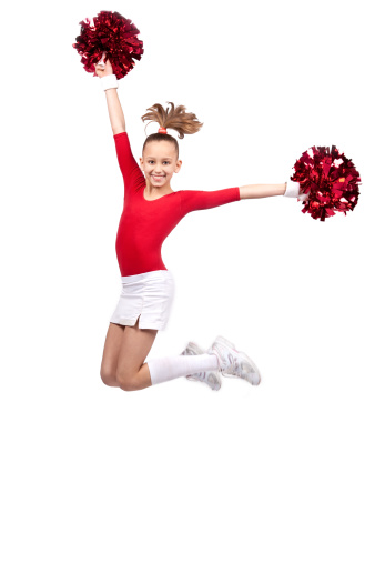 little girl in sportswear with pompoms jumping smile