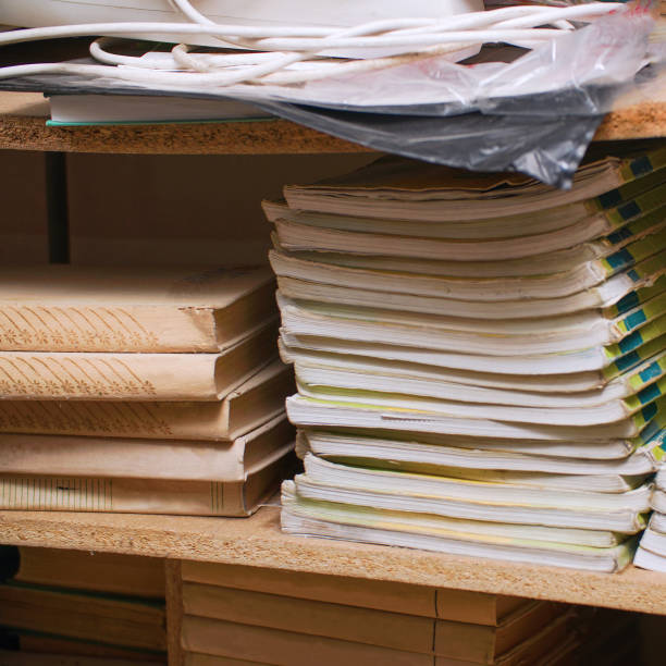 istock Stacks of books on a shelf in the library 1382980601