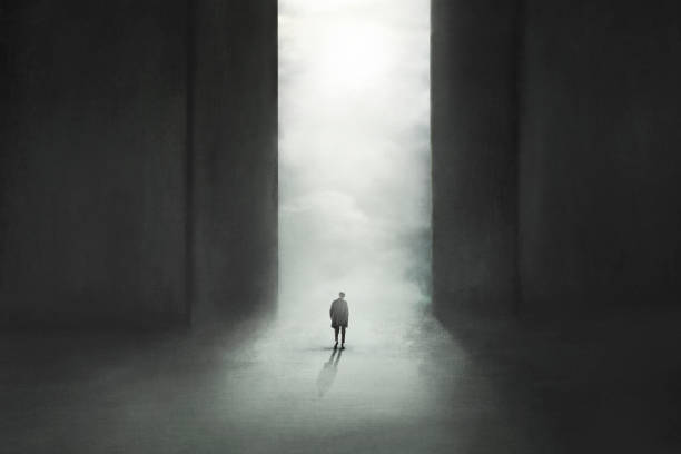 istock illustration of a man walking towards a giant open door 1382984575