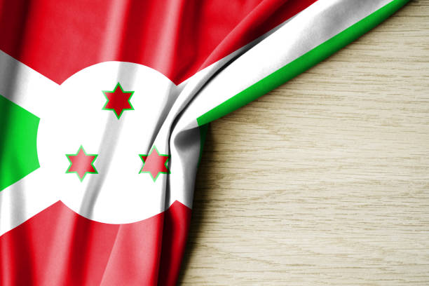 Burundi flag. Fabric pattern flag of Burundi. 3d illustration. with back space for text. Close-up view.