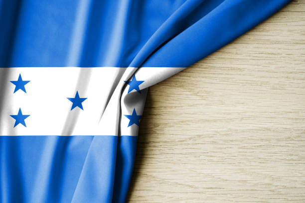 Honduras flag. Fabric pattern flag of Honduras. 3d illustration. with back space for text. Close-up view.