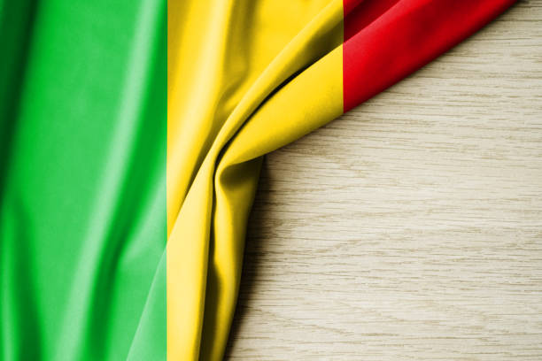 istock Mali flag. Fabric pattern flag of Mali. 3d illustration. with back space for text. 1382989470