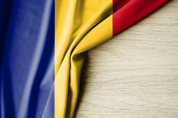 istock Chad flag. Fabric pattern flag of Chad. 3d illustration. with back space for text. 1382989523