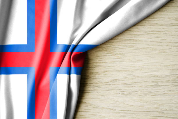 Faroe Islands flag. Fabric pattern flag of Faroe Islands. 3d illustration. with back space for text. Close-up view.
