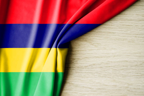 istock Mauritius flag. Fabric pattern flag of Mauritius. 3d illustration. with back space for text. 1382989766