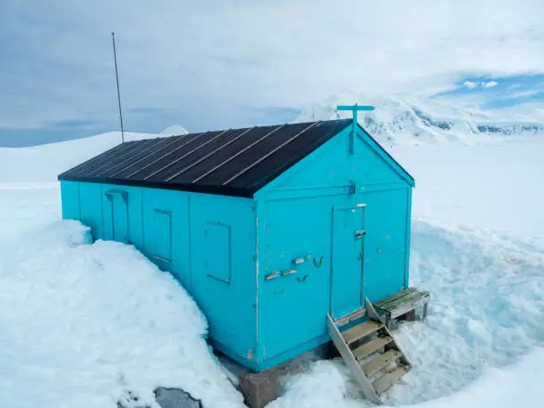 Photo of Well-preserved British scientific station standing at Damoy Point, near Port Lockroy, Palmer Archipelago, Antartctic Peninsula, Antarctica