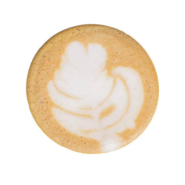 istock Top view. texture coffee latte art on cup isolated white background. 1382998528