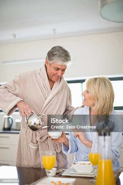 Couple Having Breakfast Together Stock Photo - Download Image Now - 45-49 Years, 50-54 Years, Adult