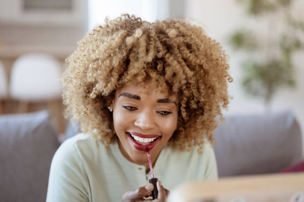 istock Finishing it off with a little gloss 1383007897