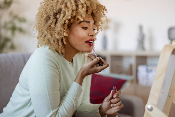 istock Finishing it off with a little gloss 1383007923