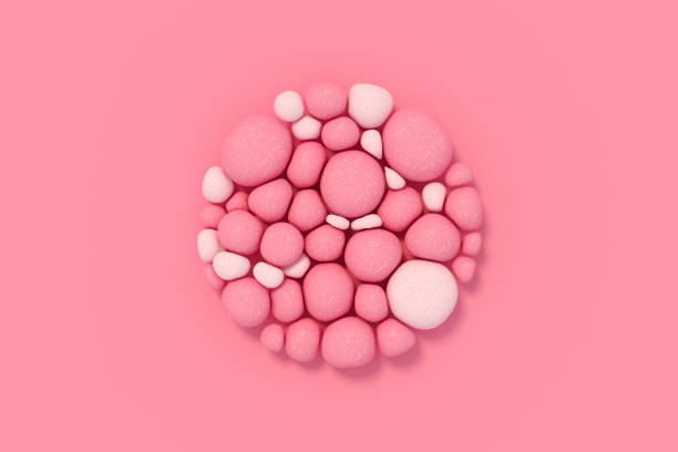 istock Soft stone spheres in circle shape abstract pink color background 1383008201