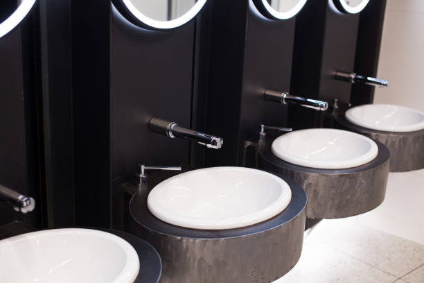 istock Modern wash basins in a public bathroom 1383011483