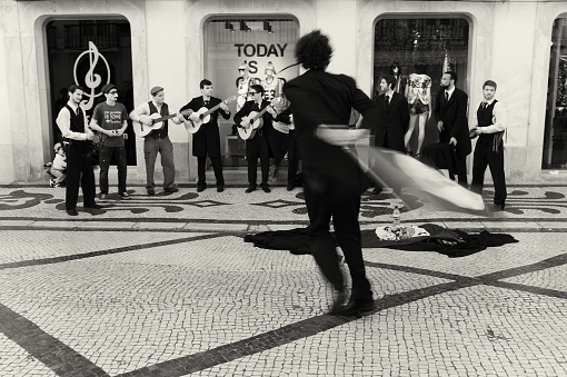 Lisbon, Portugal - April 12, 2014: College students perform at the Rua Augusta street in Lisbon downtown.