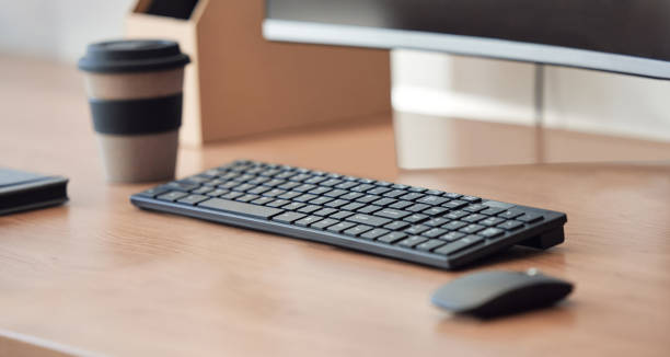 istock Shot of an empty workspace at an office 1383018261