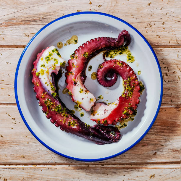 istock cooked octopus with garlic and parsley 1383020150
