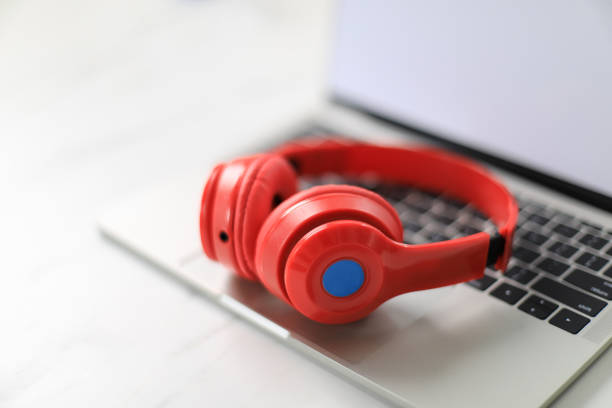 Headphone on laptop, convenient equipment for communication and entertainment