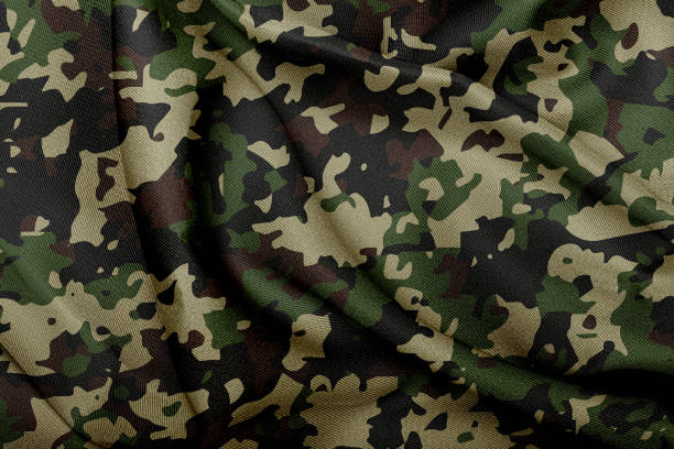 Camouflage pattern cloth texture background stock photo