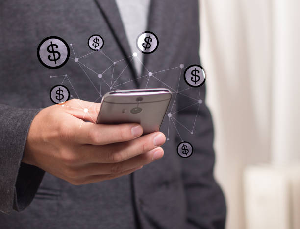 istock Close up of a man using mobile smart phone to buy and pay. Virtual wallet app. 1383028077